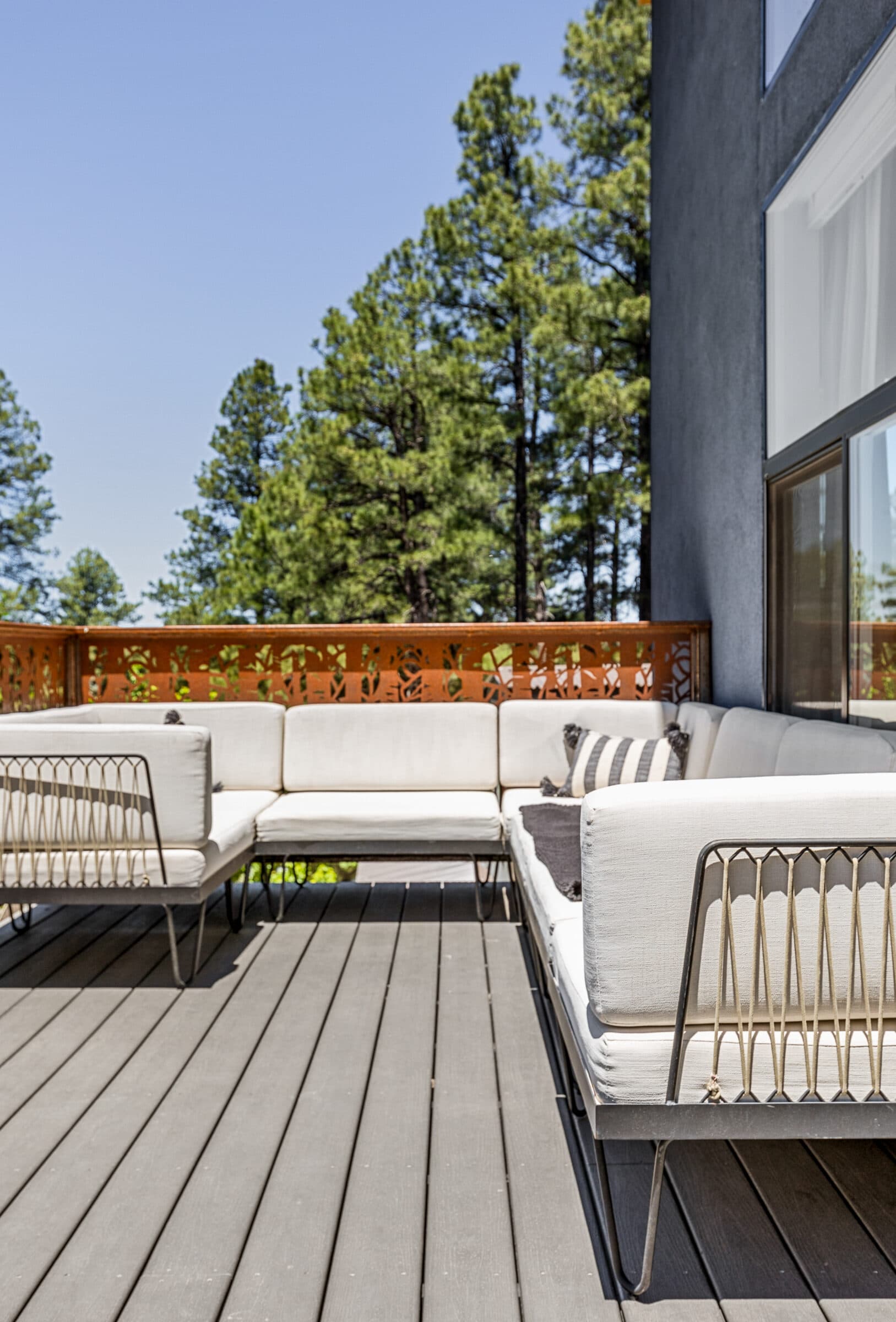 Deck lounge looking out over the pines