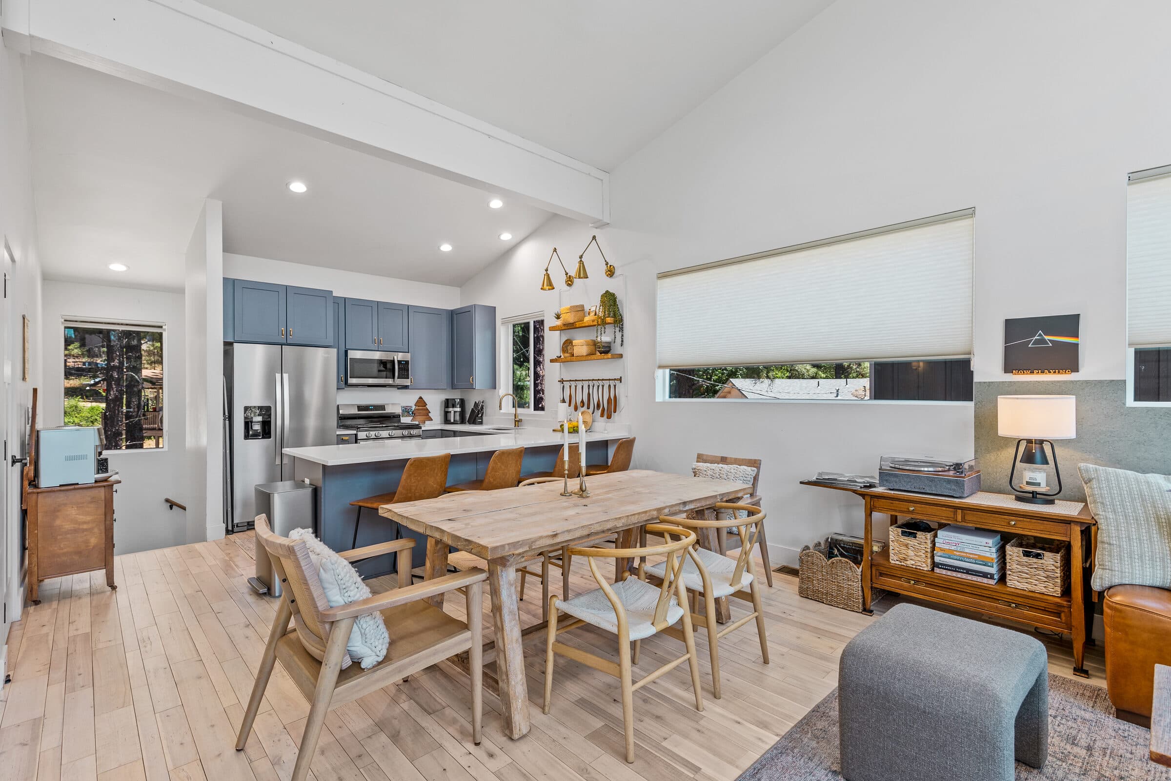 Dining table set beneath the vaulted ceiling