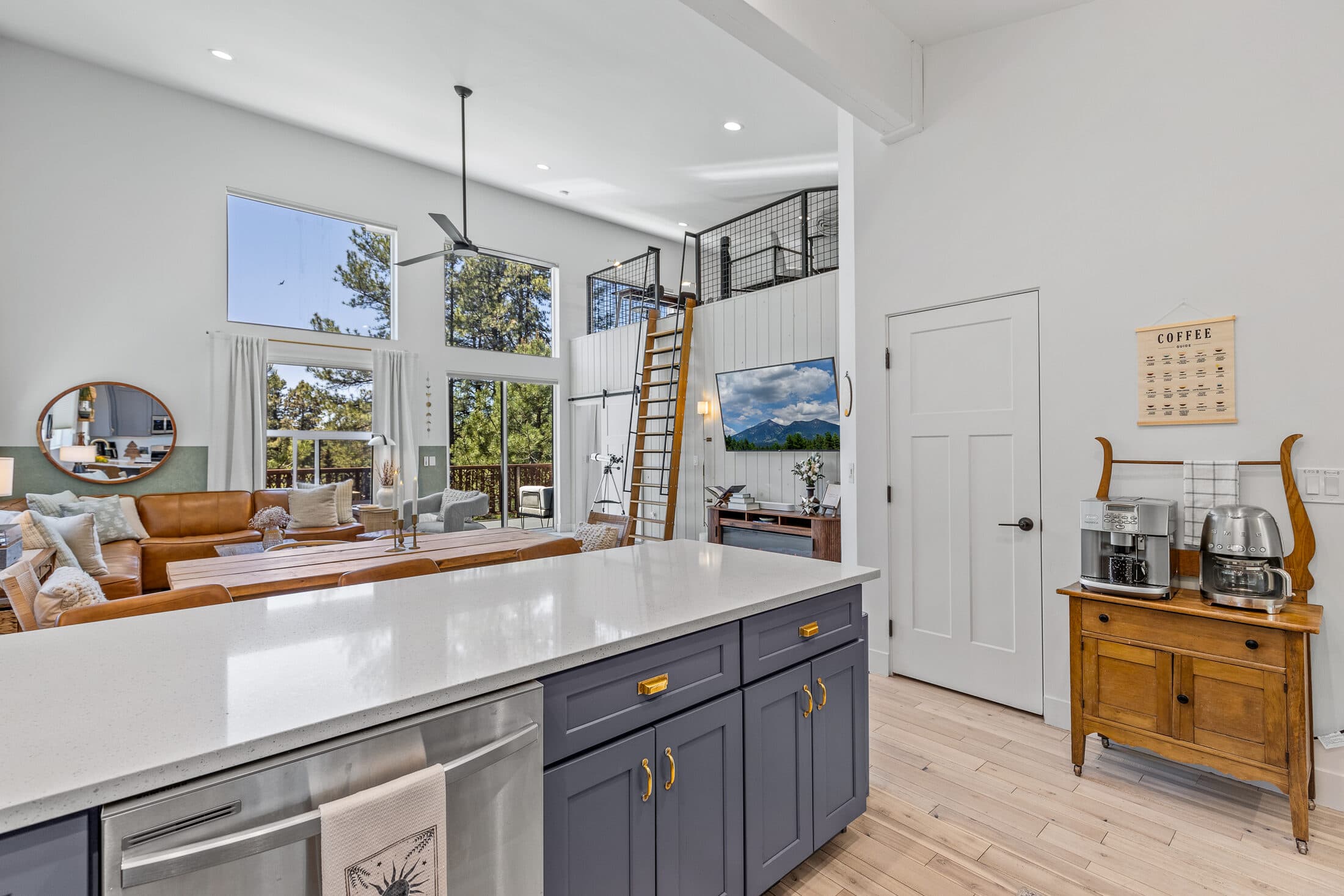 Kitchen and dining open to the loft above