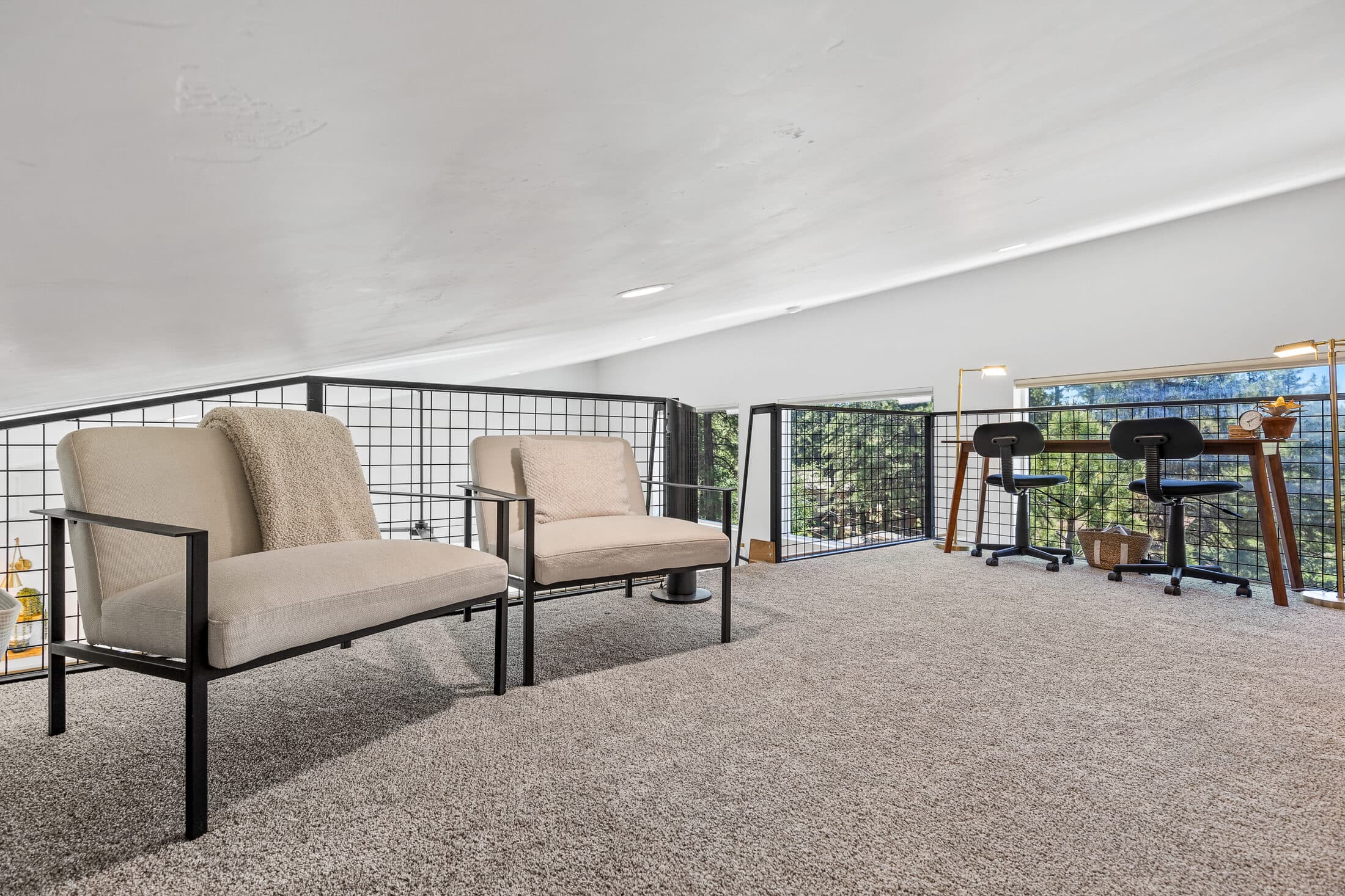 A quiet seating nook in the loft overlooking the great room