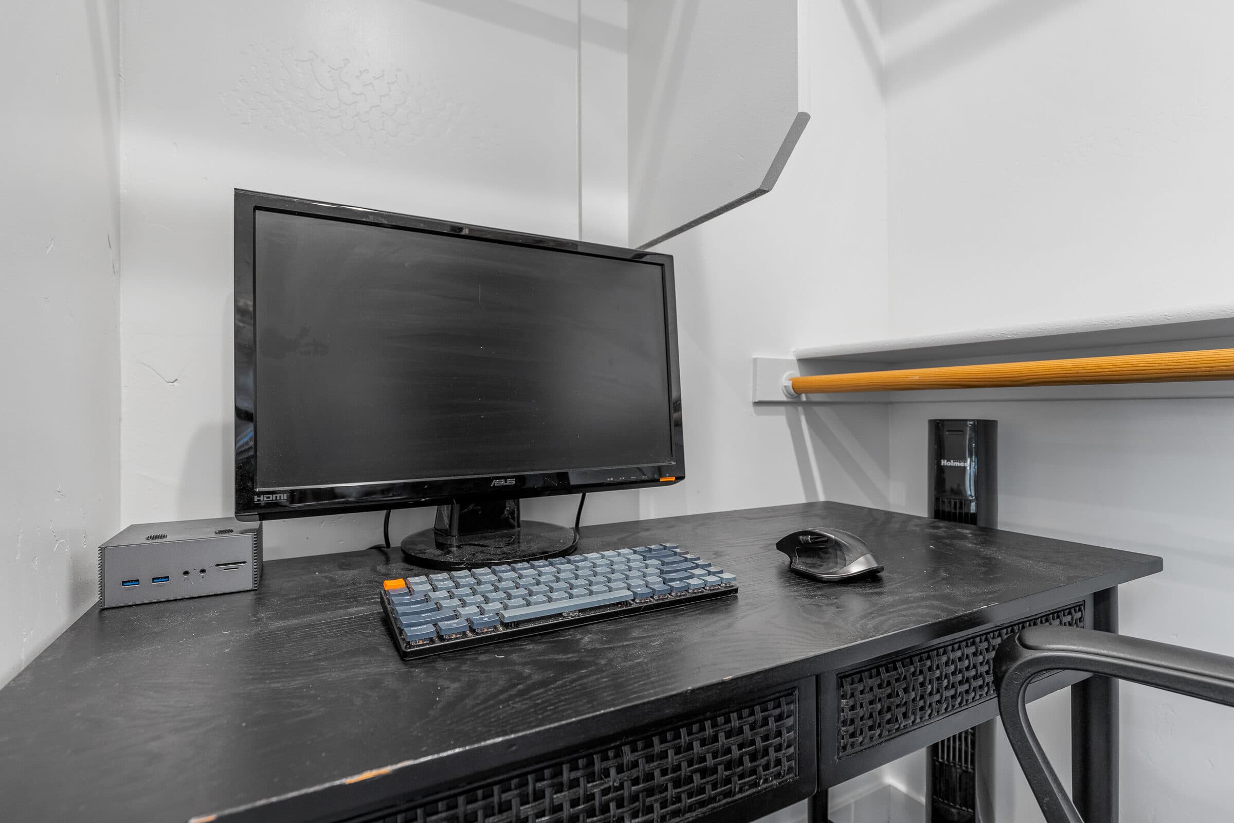 Dedicated workspace with a monitor and ergonomic chair