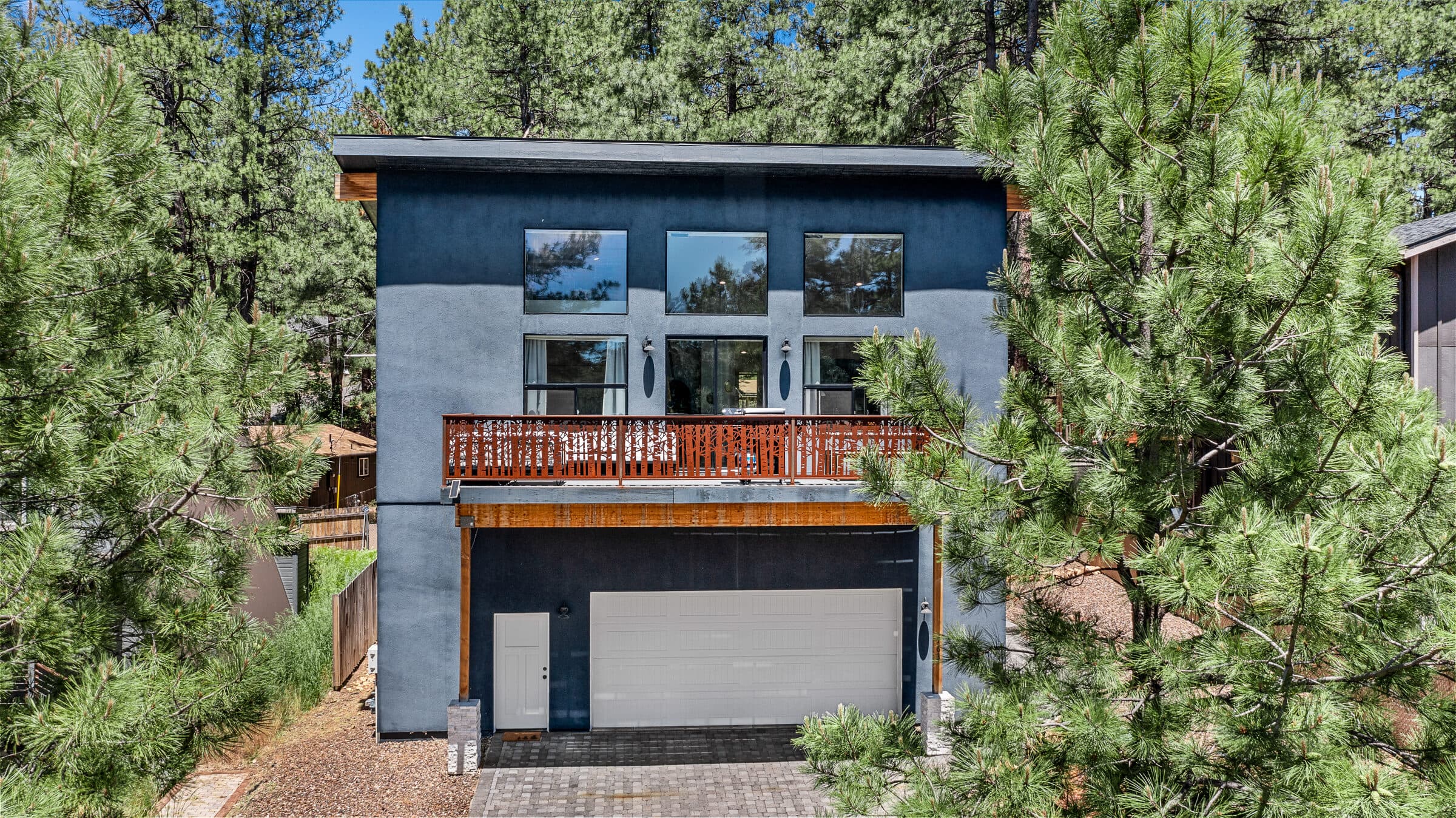 The cabin set among tall ponderosa pines in Flagstaff